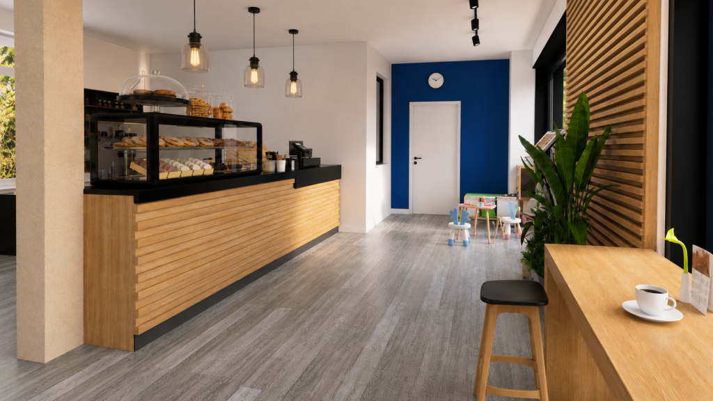 Geplante Verkaufstheke aus Holz mit Kuchenvitrine, Pendelleuchten und Sitzbereich im Blue Kaffee - Interior Design für Cafés in Nürnberg - Blue Kaffee 2